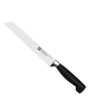 Couteau à pain Four Star Zwilling sur planche