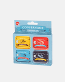 Lot de sous-verres antidérapants Balvi en forme de boîtes de conserve rétro, parfaits pour une décoration originale et festive.
