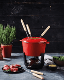 Caquelon en fonte émaillé rouge du service à fondue Beka
