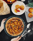 Tourtière 28 cm Emile Henry en céramique, pour des tartes et tourtes parfaitement dorées.

